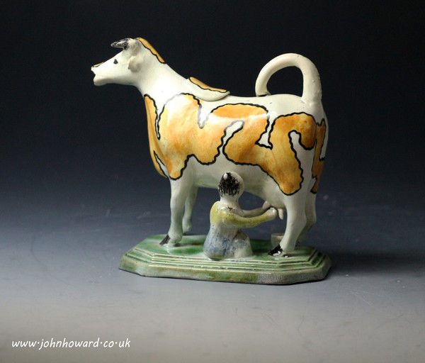 Antique English pottery cow creamer circa 1800