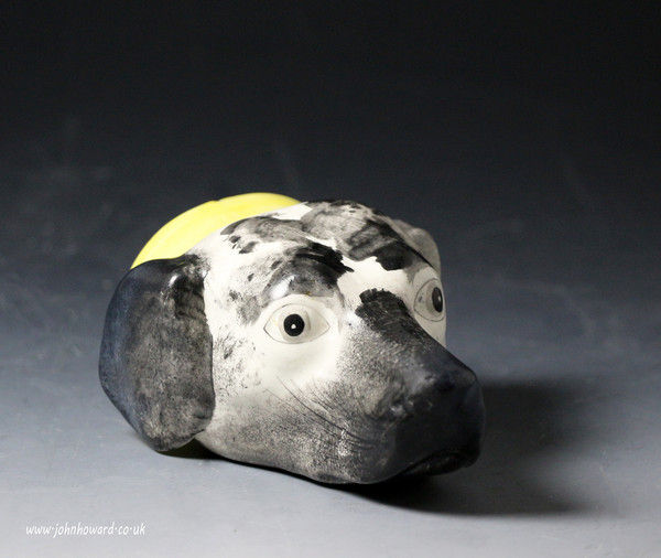 Antique English pottery hound head stirrup cup .Staffordshire  early 19th century