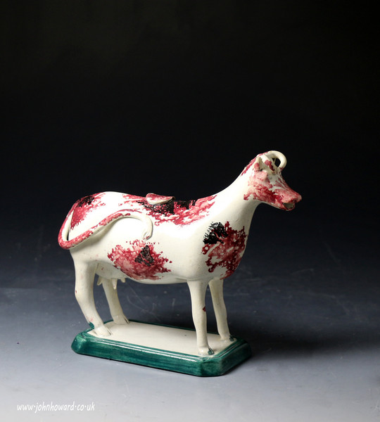 Antique English pottery figure of a cow creamer turn of 18th century