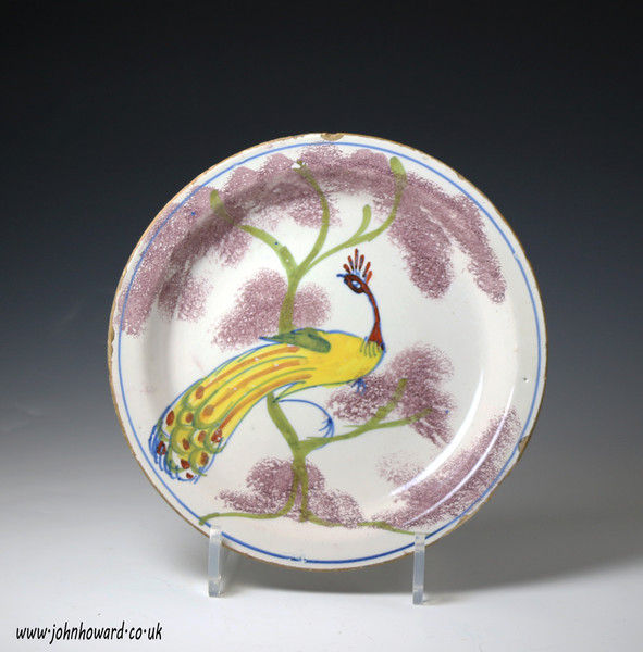 English delftware farm plate with peacock in tree Bristol  circa 1725