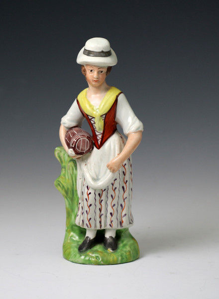 Antique Staffordshire pottery figure of a Hay making girl early 19th century.