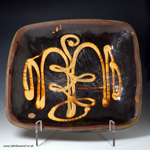 Early English pottery slipware loaf dish  late 18th century probably Staffordshire