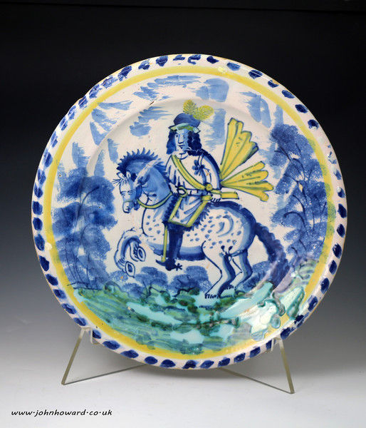 English Bristol delftware blue dash pottery charger with an equestrian figure late 17th century