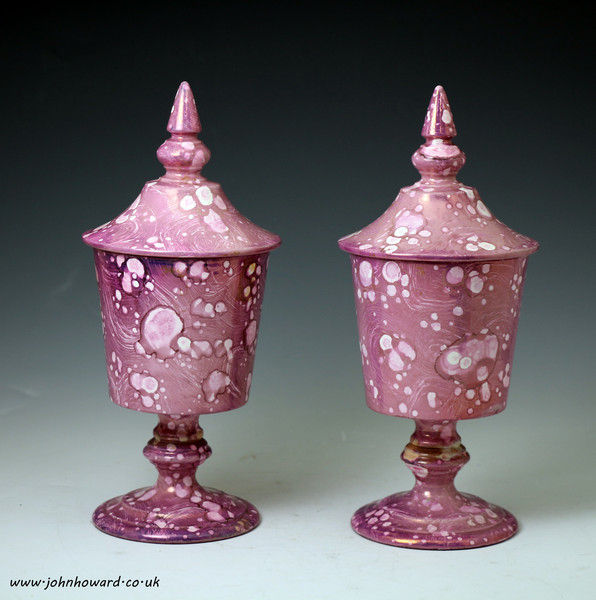 Pair of English pink luster pottery goblets with covers early 19th century