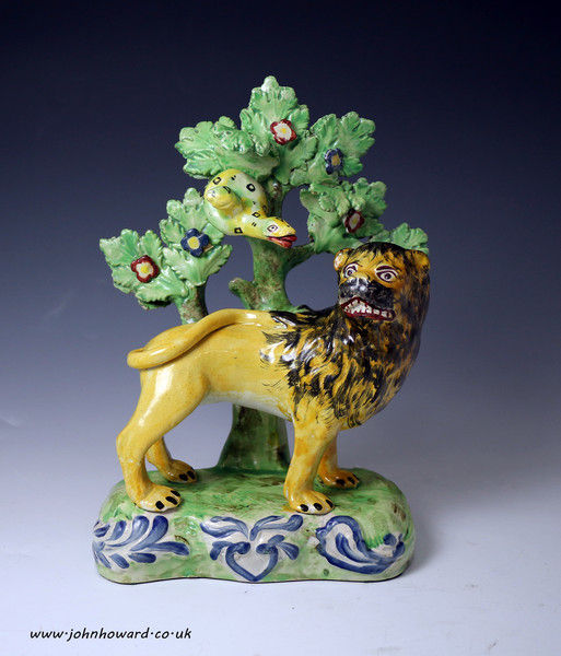 Staffordshire pottery bocage figure of a lion, early 19th century period English.