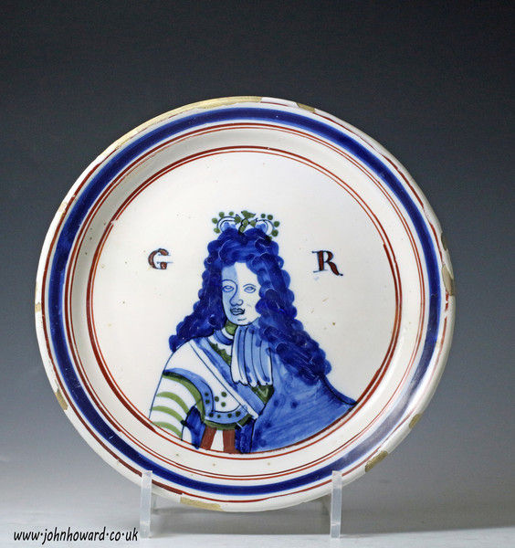 English delftware Royalty polychrome coloured plate with portrait of King George 1 date c1715