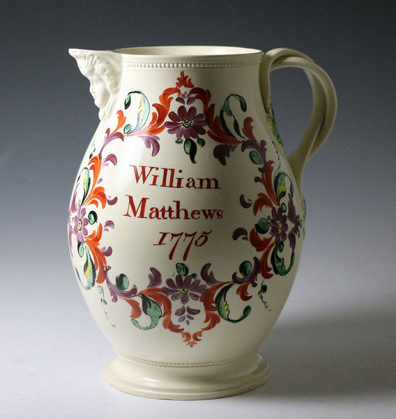 Antique English creamware pottery pitcher named William Mathews and dated 1775