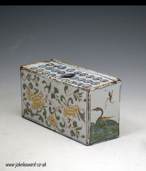 English Delftware pottery polychrome coloured flower brick early 18th century