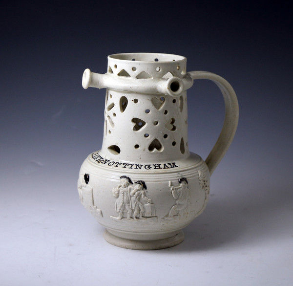 Nottingham SAltglaze puzzle jug named 