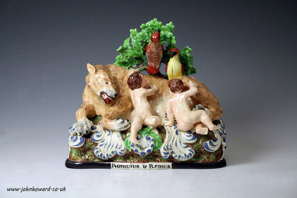 Staffordshire pearlware pottery figure of Romulus and Remus with bocage c1820 English.