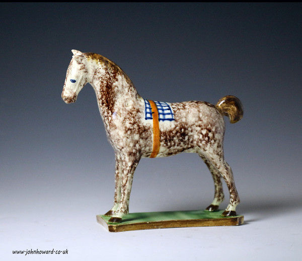 Pottery figure of a horse modelled standing on base North East England circa 1800