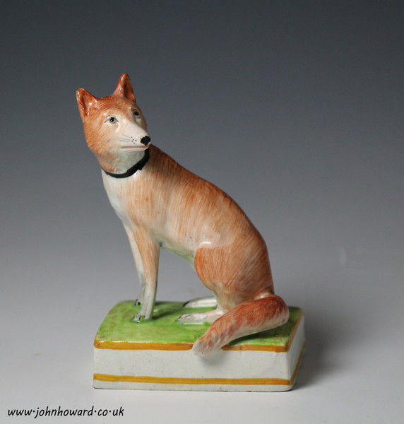 Antique Staffordshire pottery figure of fox .English circa 1820 period