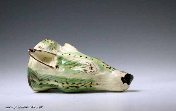 Creamware body pottery fox head stirrup cup. circa 1780 antique period England.