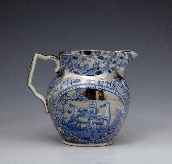 Silver luster and blue enamel decorated pitcher English early 19th century