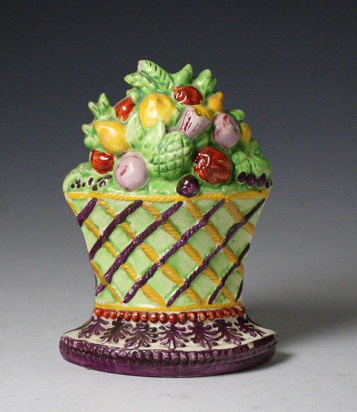 Antique Staffordshire basket of fruit and leaves 