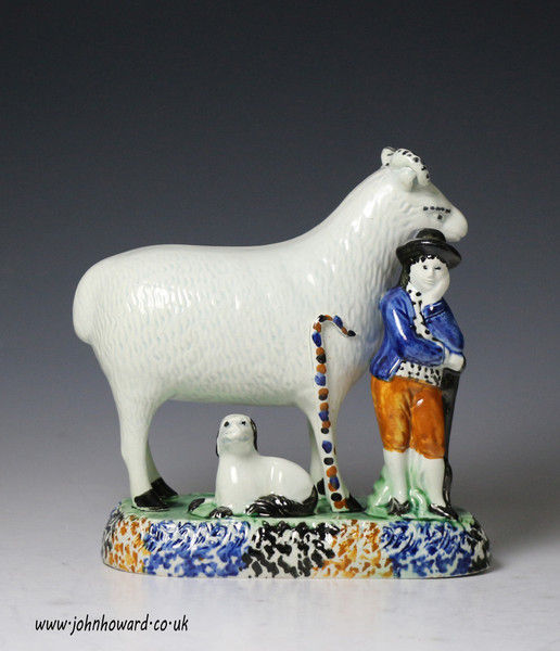 Yorkshire pottery figure a ram with diminutive shepherd.antique period c1810