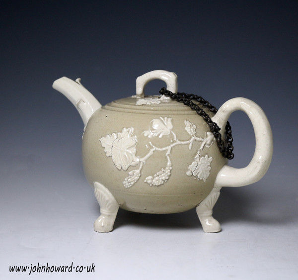 Teapot drab coloured salt-glazed stoneware with crabstock handle and shell paw feet circa 1740 Staffordshire