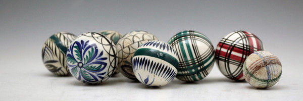 Eight rare miniature Pottery carpet balls (the largest 1.75 diameter) mid 19th century.