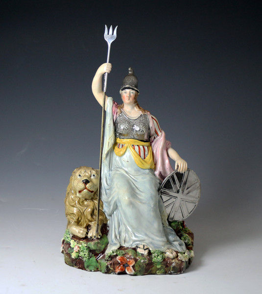 Antique Staffordshire pottery figure of Britannia with Lion. Wood and Caldwell Pottery c1815