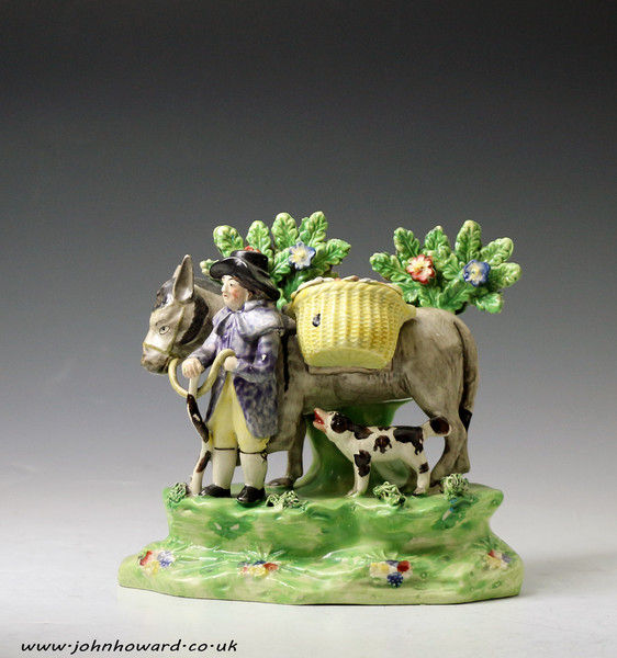 Antique Staffordhire Pottery pearlware bocage figure of the JOLLY TRAVELLER early 19th century England.