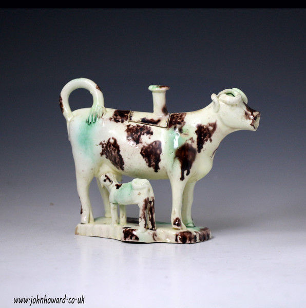 Early Staffordshire pottery figure of a cow creamer probably Thomas Whieldon c1770