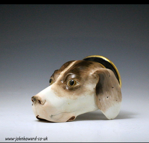 Early 19th century stirrup cup in the form of a hounds head. Attributed to the Derby Works.