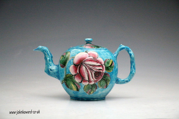 Staffordshire saltglaze stoneware enamel decorated teapot  18th century English.