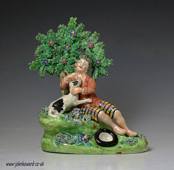 Antique Staffordshire pottery pearlware figure of shepherd boy with dog early 19th century