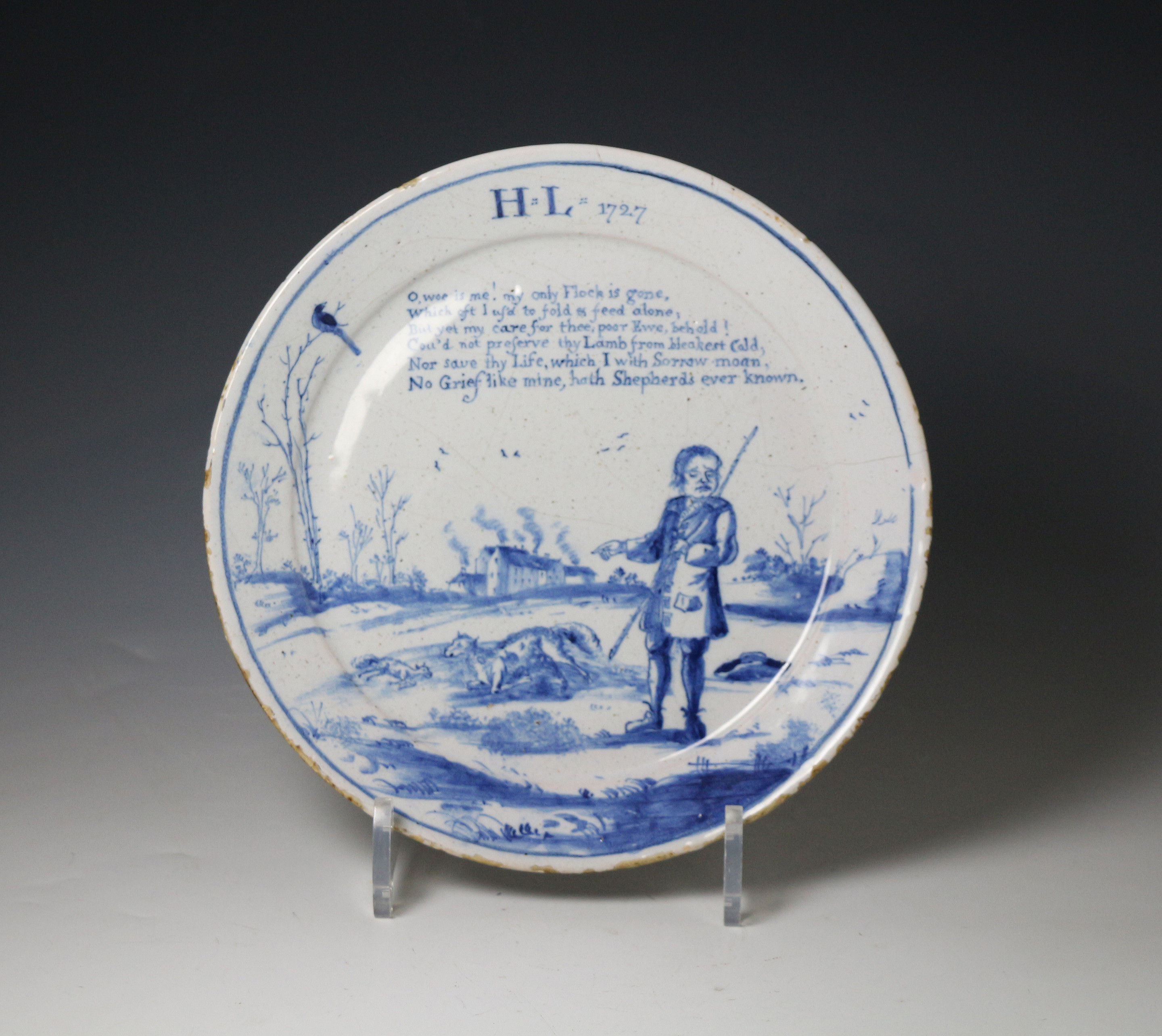 English delftware plate dated  1727 with the initails