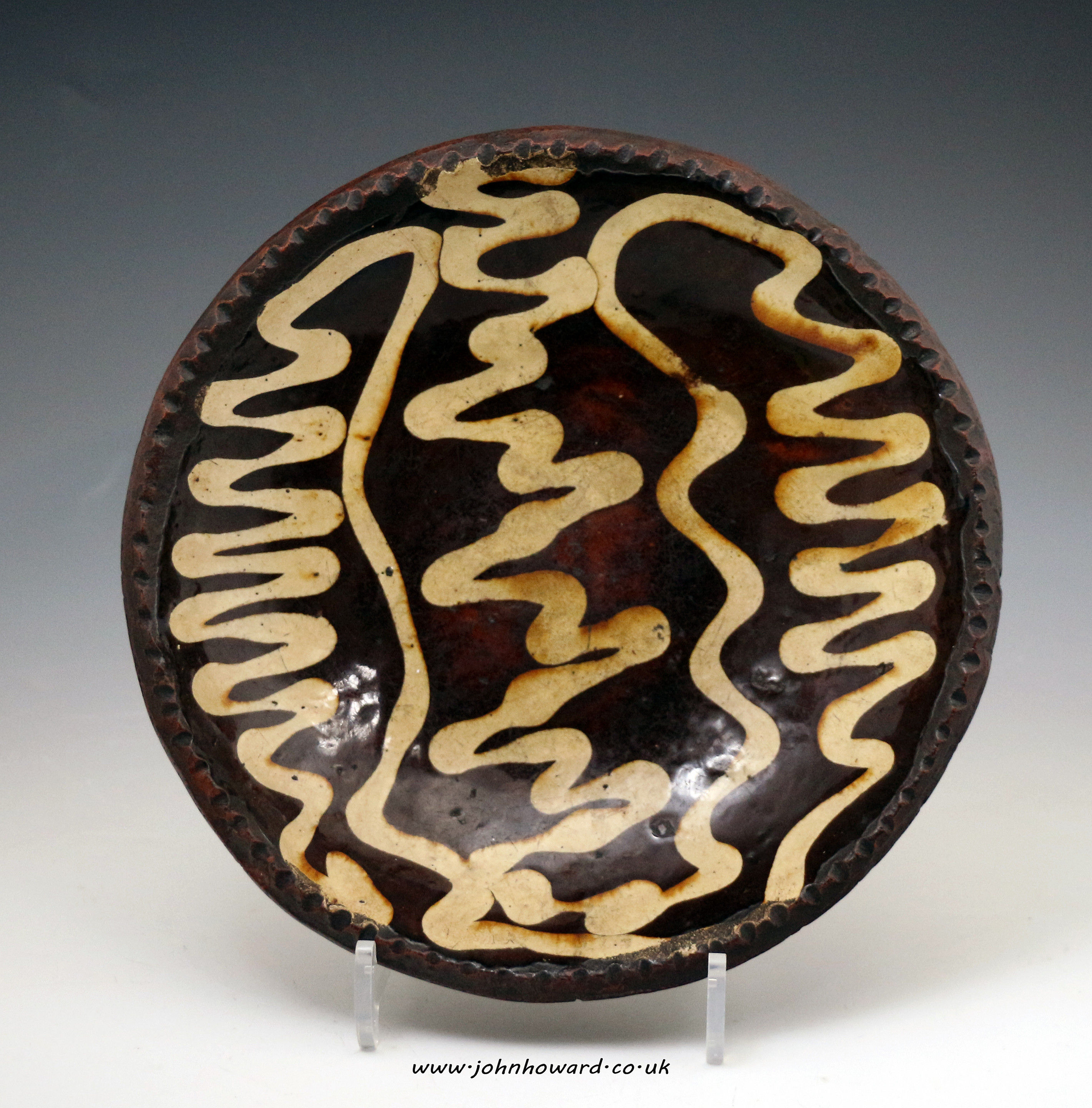 Antiques English slipware dish late 18th century period.