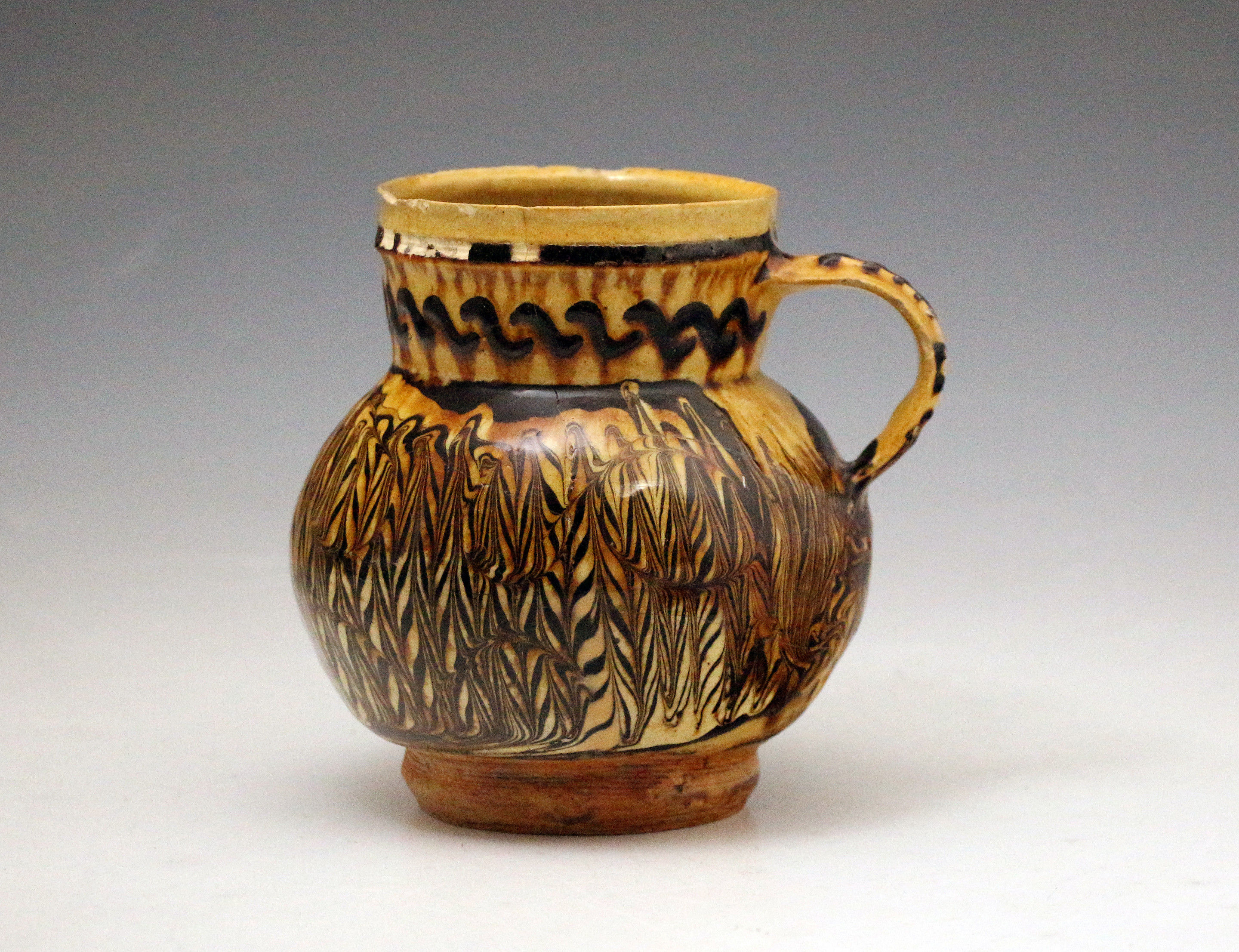 Slipware pottery tankard late 17th century England