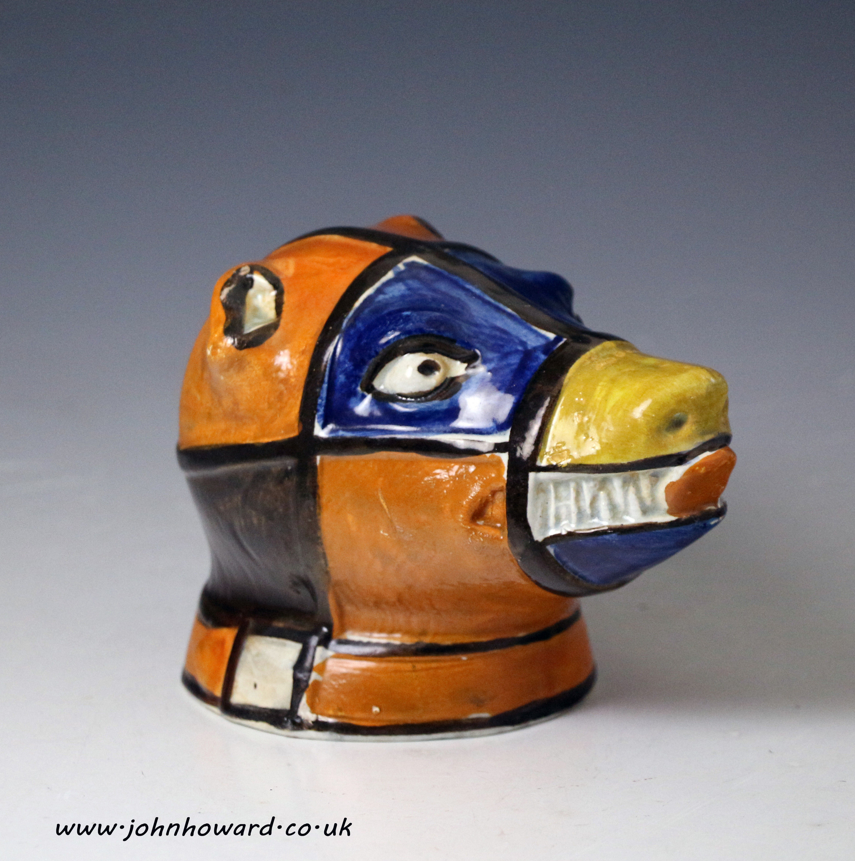 Antique English pottery bear head stirrup cup in Prattware circa 1810