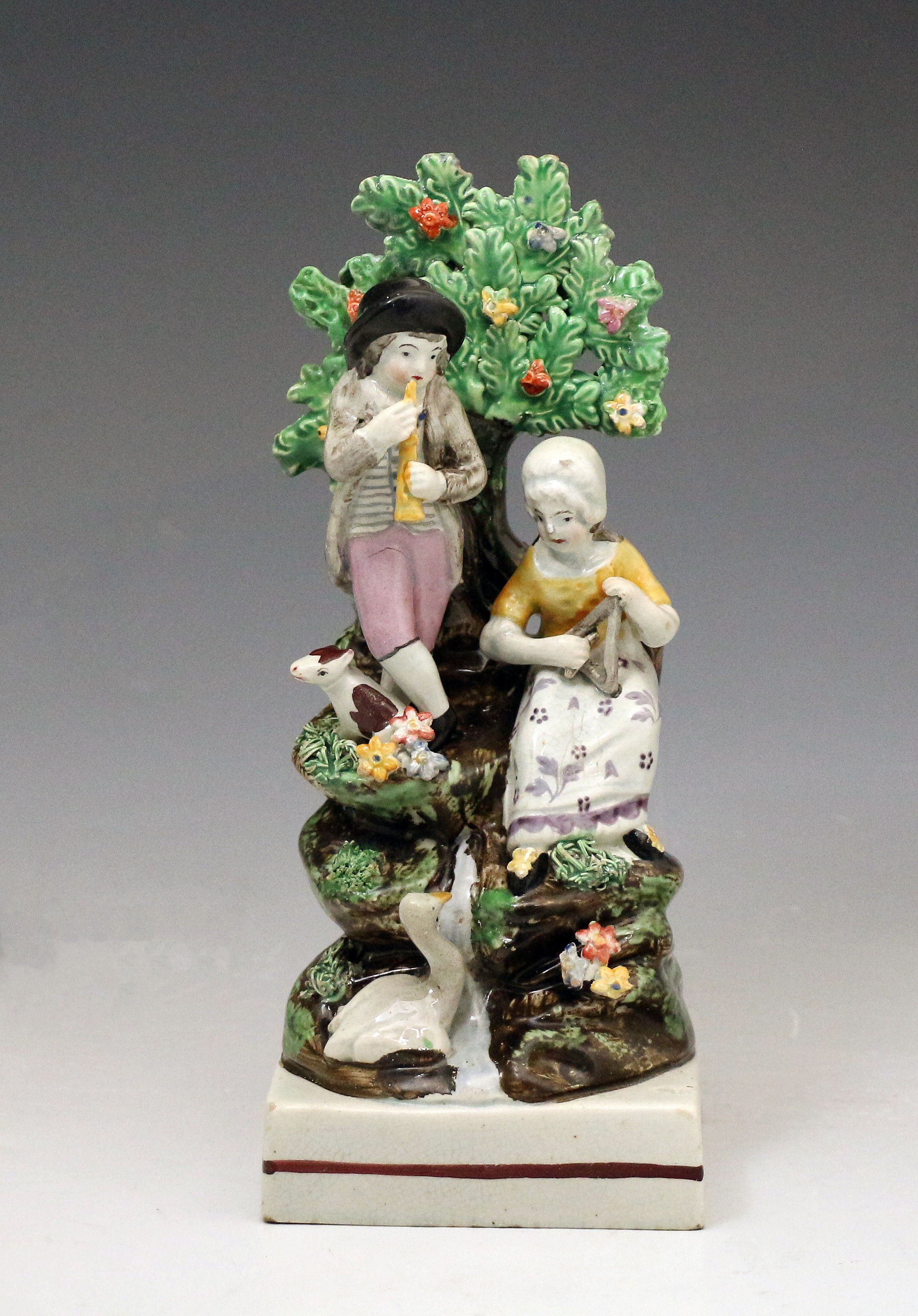 Staffordshire pottery bocage figure group, pearlware square base early 19th century English