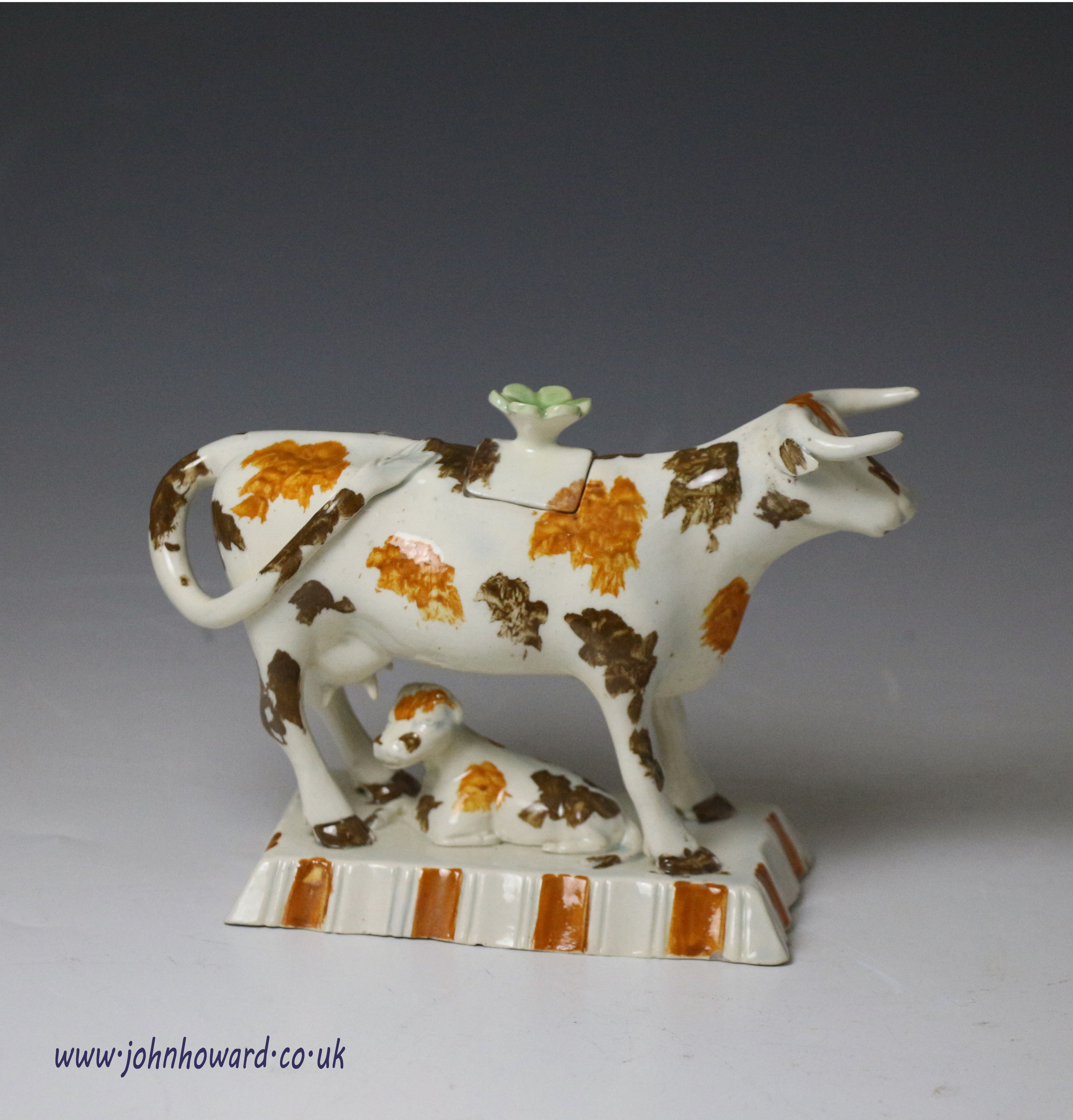 Antique English pottery cow creamer, Pratt colours late 18th century