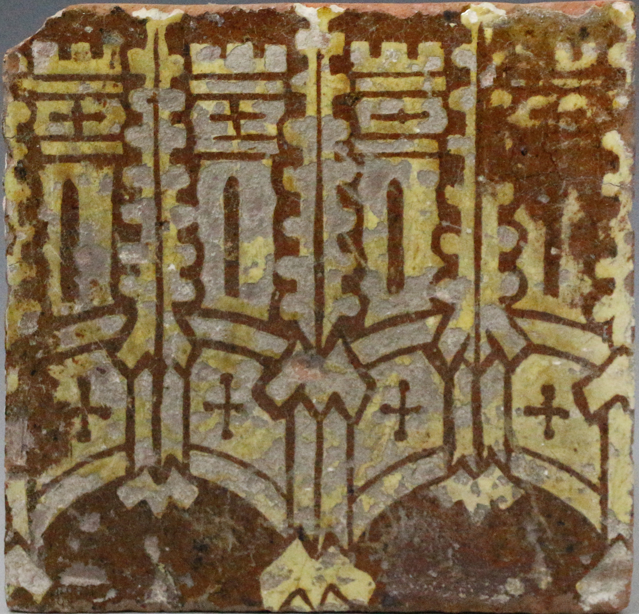 English Medieval tile slip decorated with turrets and pinnacles.Malvern Abbey England