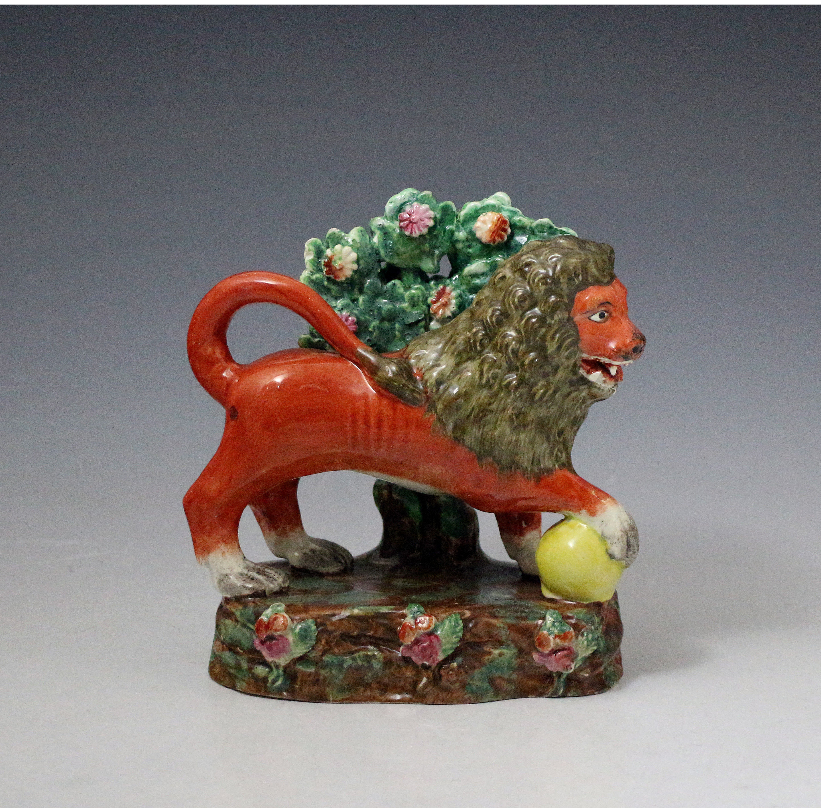 Antique Staffordshire pottery figure of a lion by Obadiah Sherratt early 19thc.England
