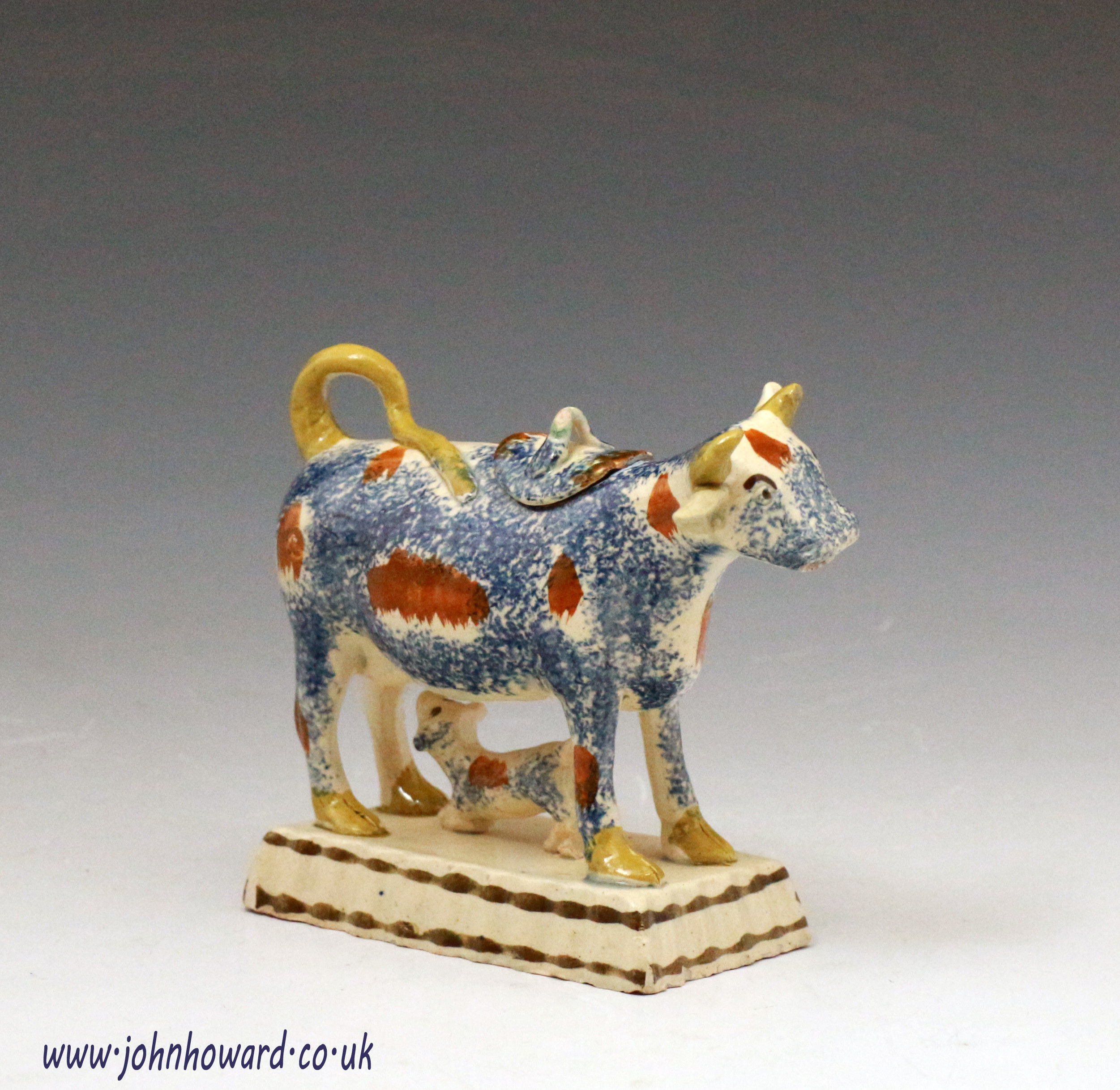 Antique English pottery figure of a cow creamer late 18th century 