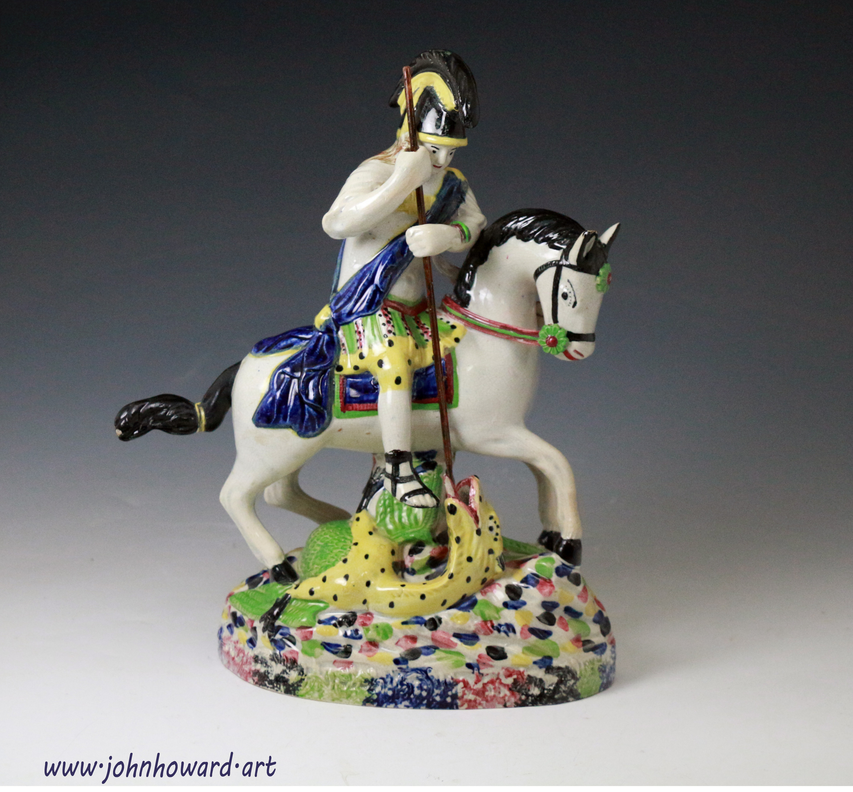 English pottery figure group Saint George slaying the dragon made in 1815 period.