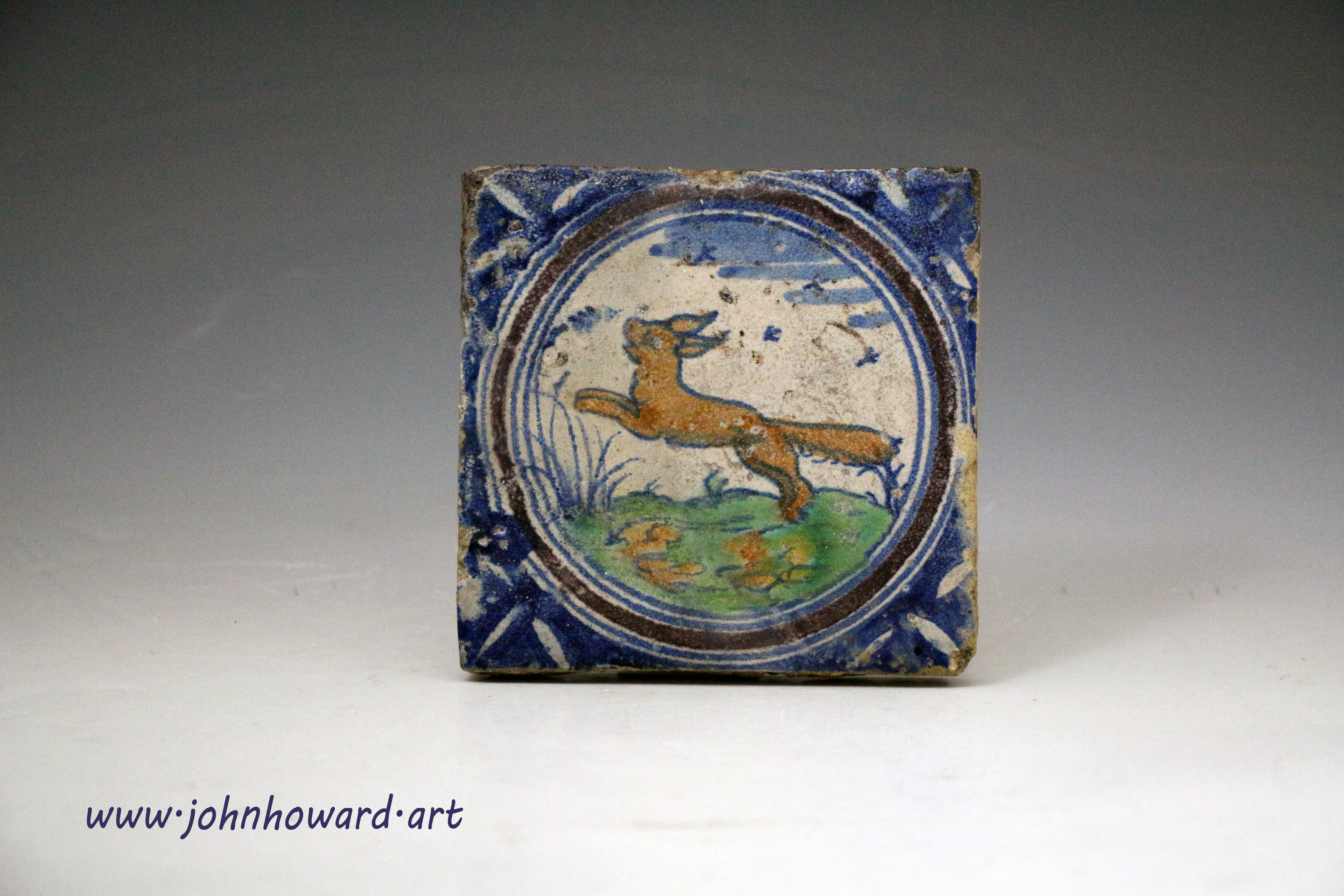 English Delftware tile with figure of a fox probably Pickle Herring London early 17th century