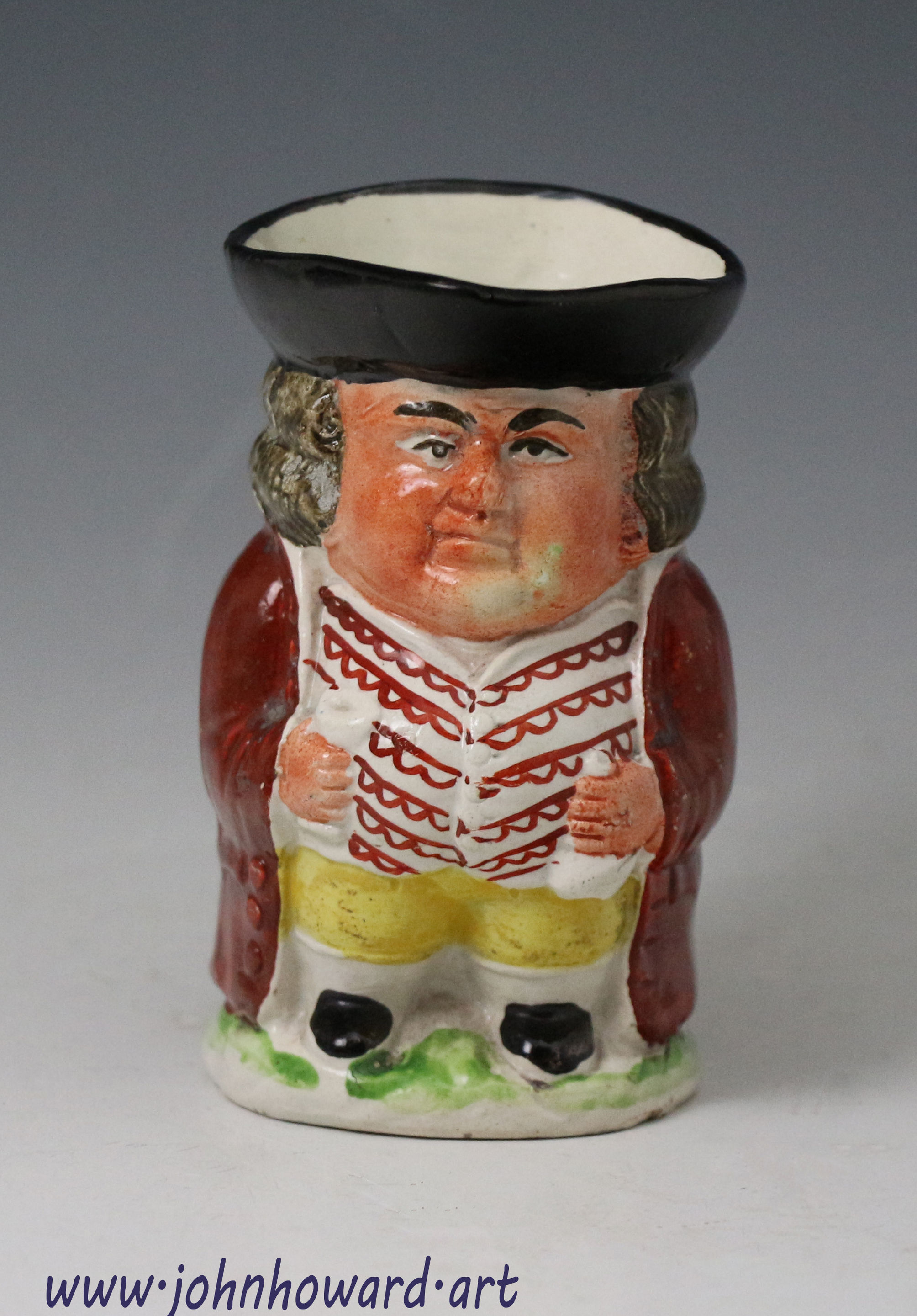 Staffordshire pottery pearlware Toby jug figure early 19th century England