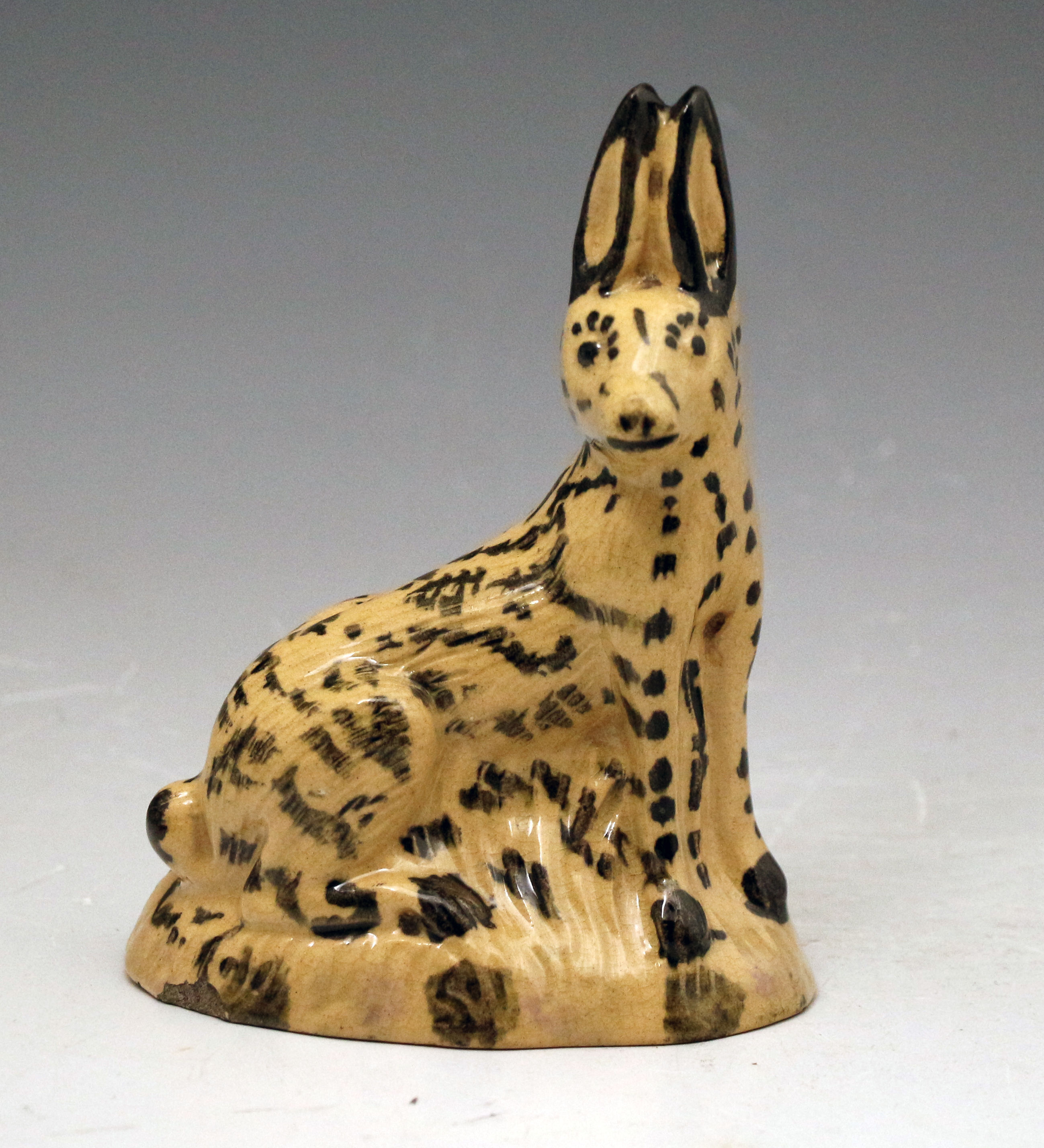 Antique English pottery figure of a seated hare North Country probably Yorkshire.