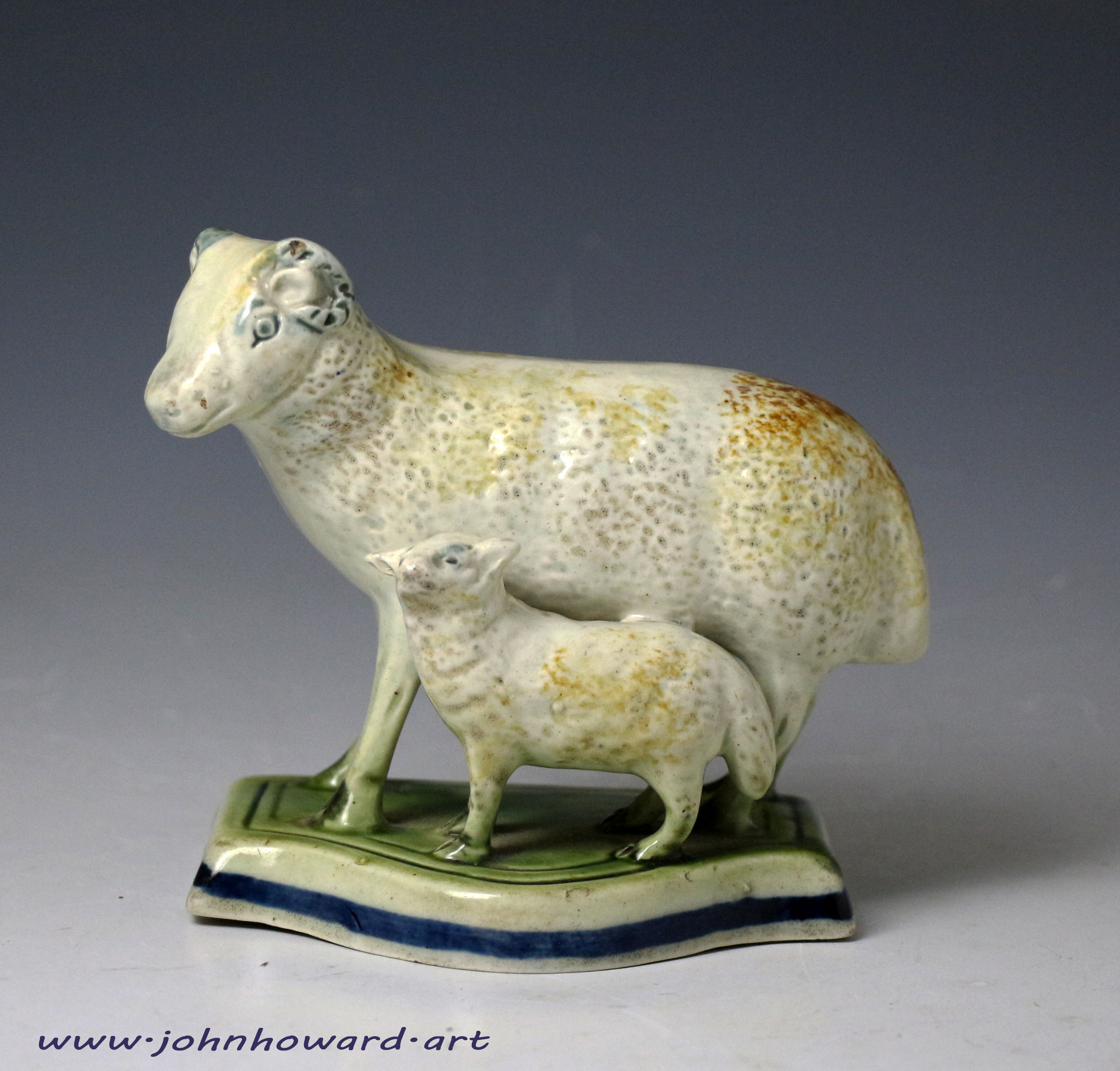 Antique English pottery figure of a ram and lamb late 18th century