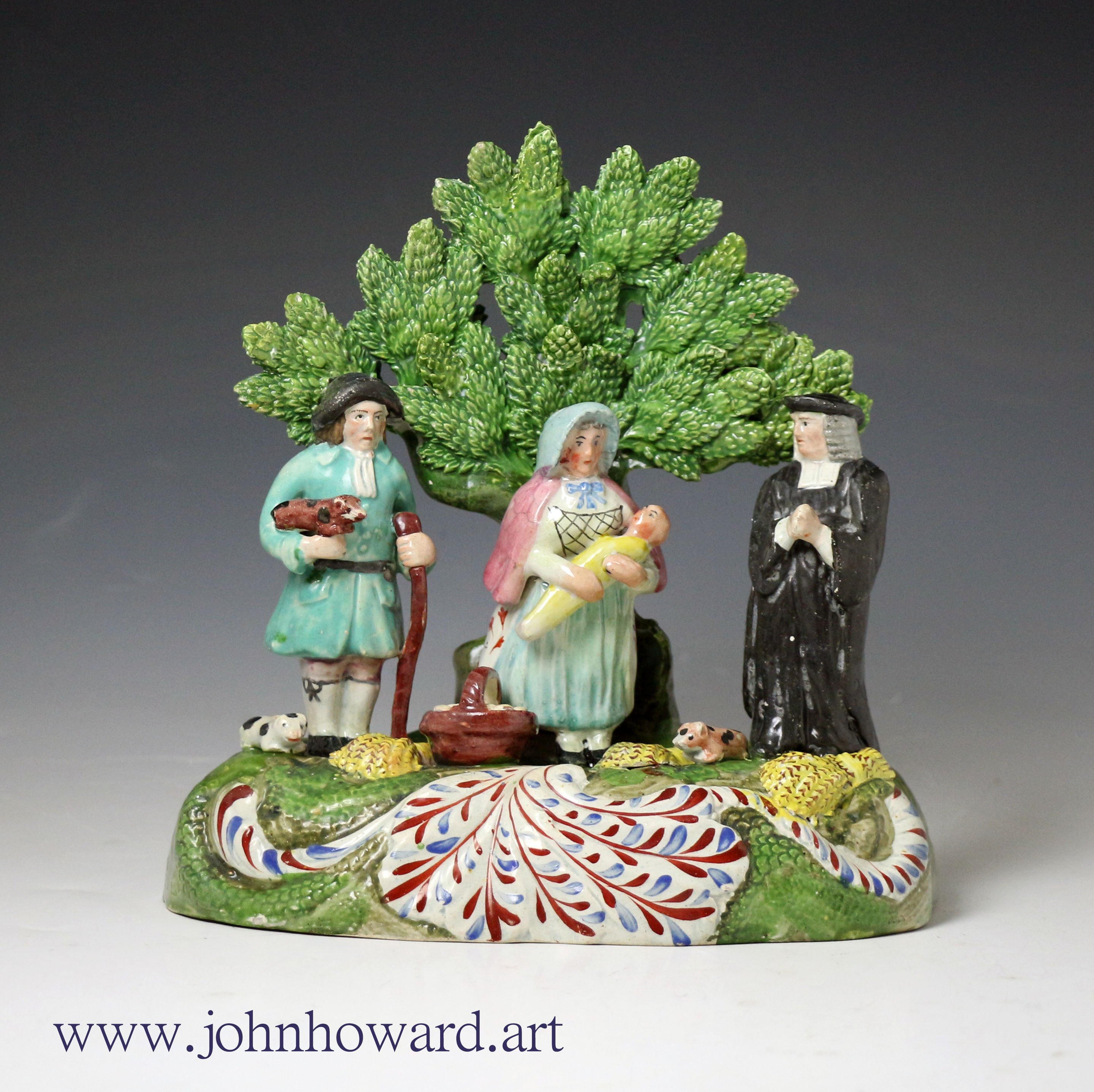 Staffordshire pottery figure of the Tithe Pig group with bocage circa 1820