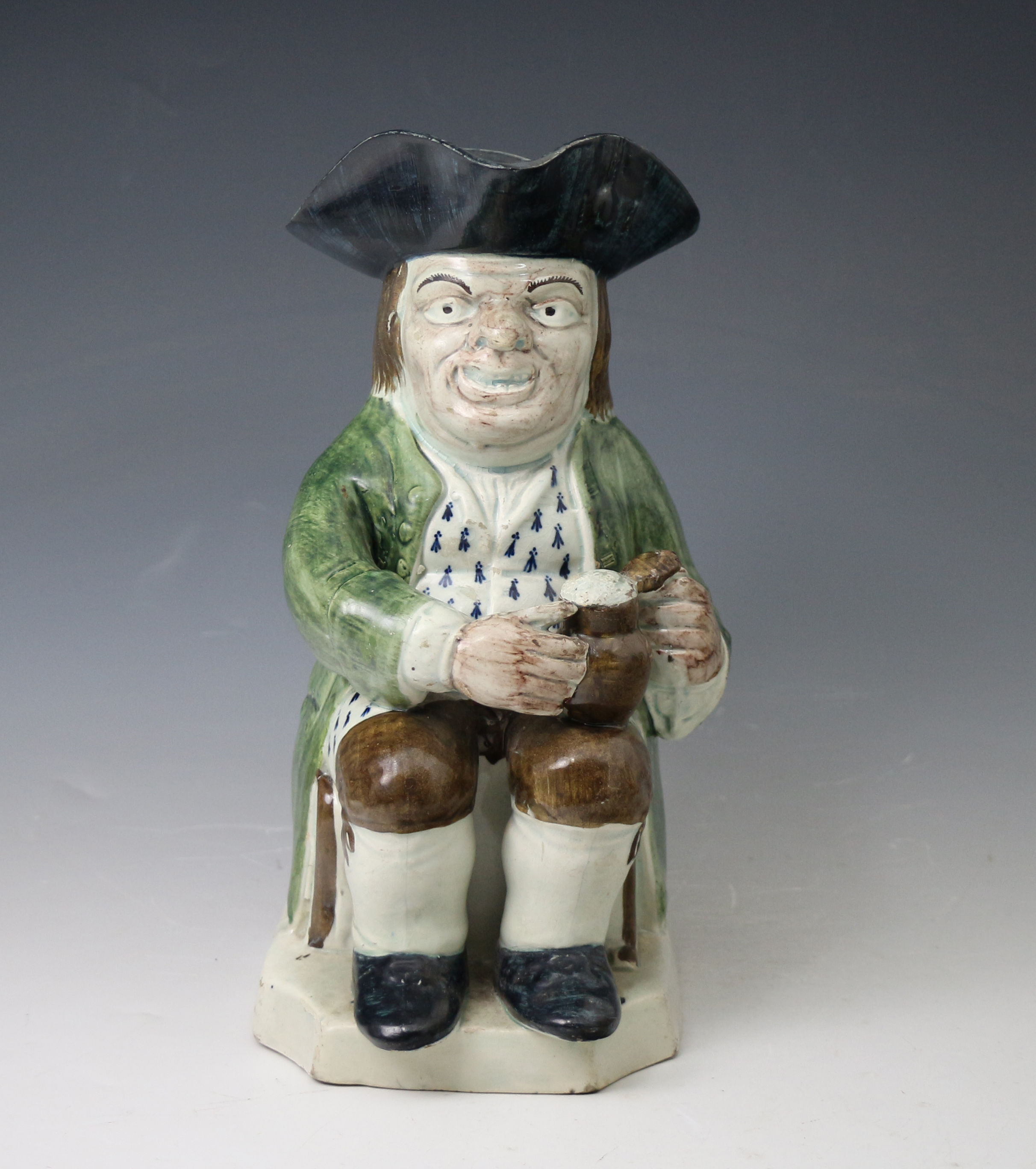 Staffordshire pottery Toby Jug in under colour glazes antique period England late 18th century