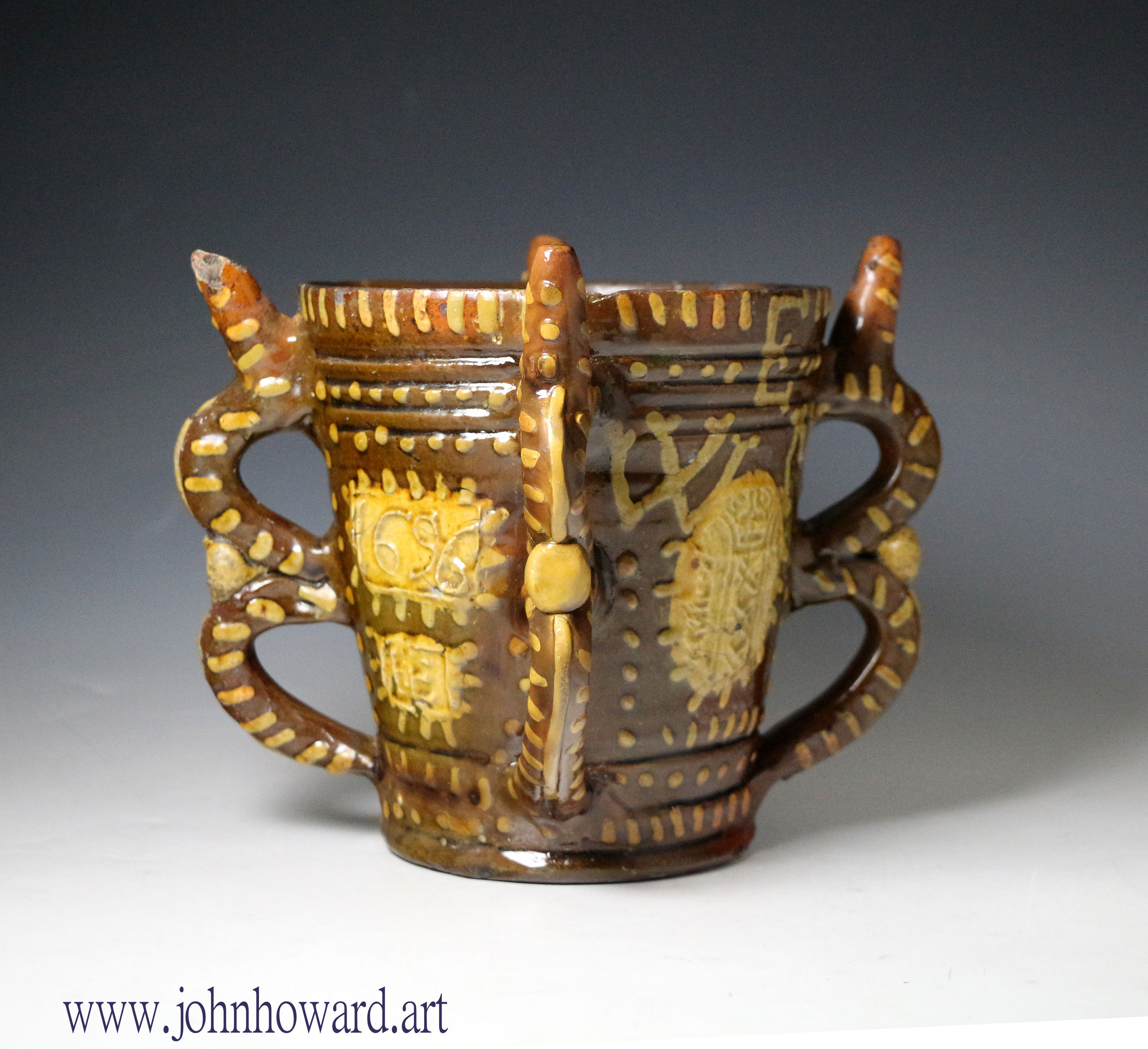 Wrotham Slipware initialled and dated puzzle tyg 17th century English earthenware