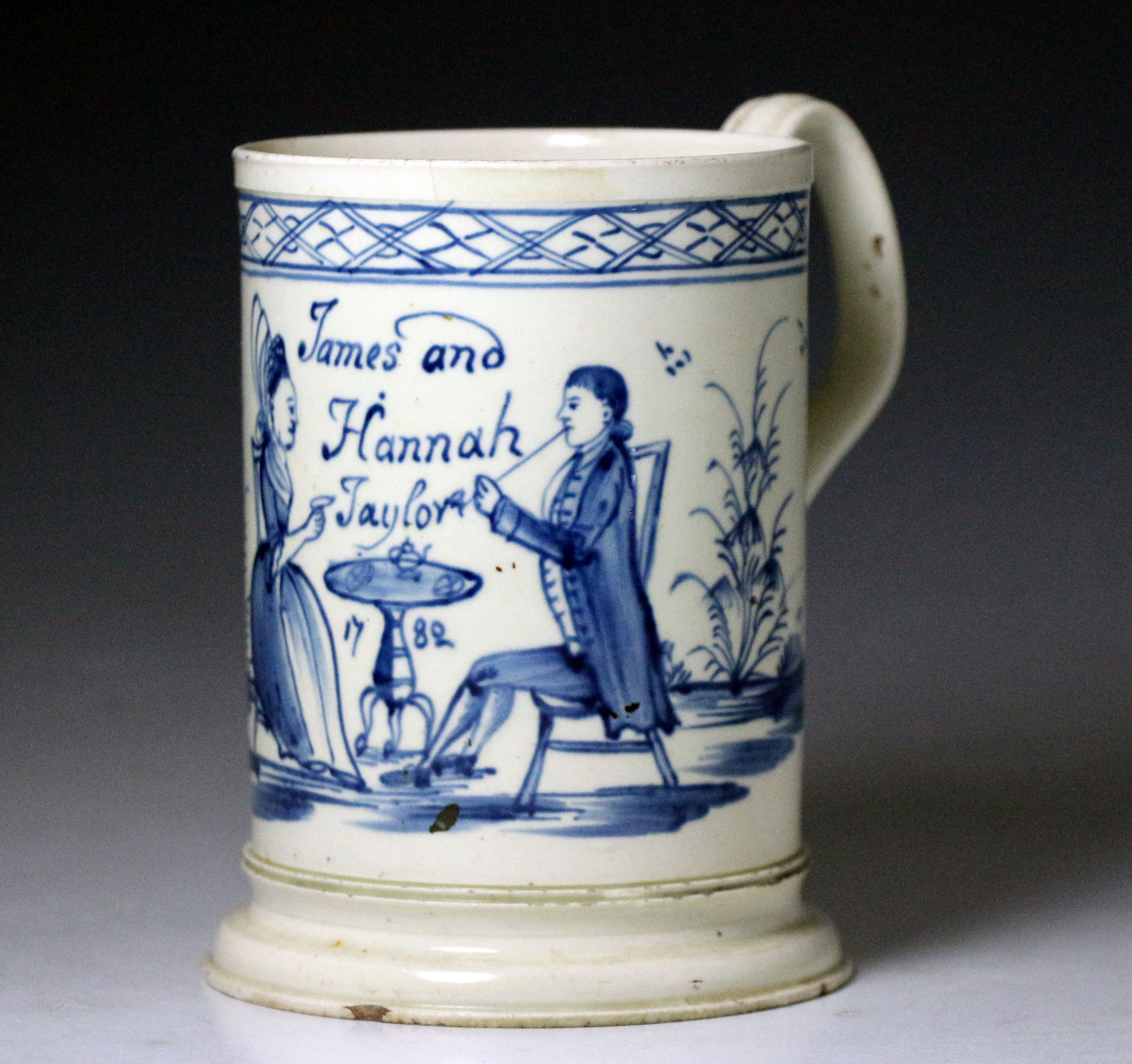 English creamware painted blue tea party tankard for James and Hannah Taylor dated 1782