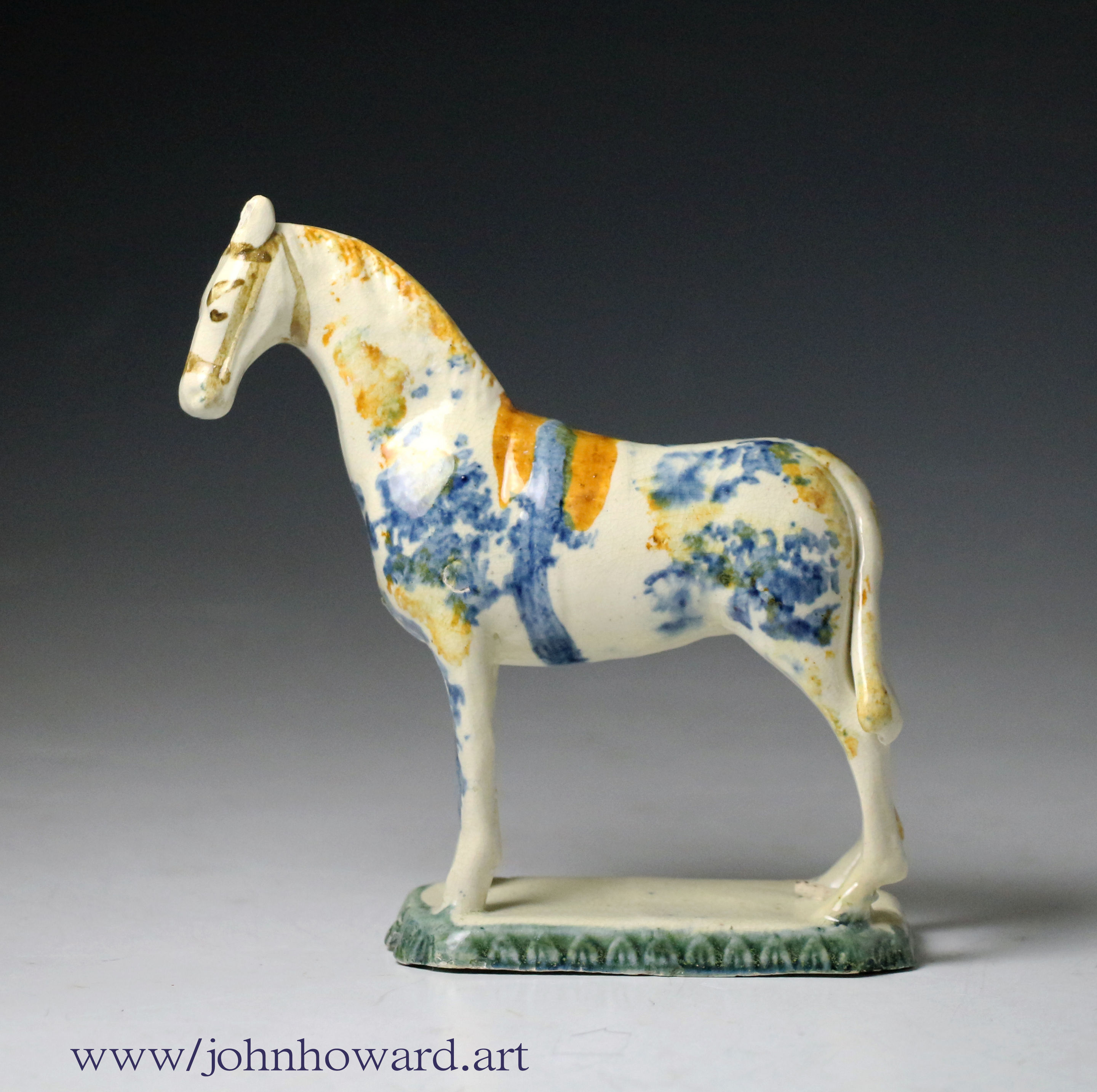 Antique English pottery Prattware sponge decorated figure of a horse  circa 1800