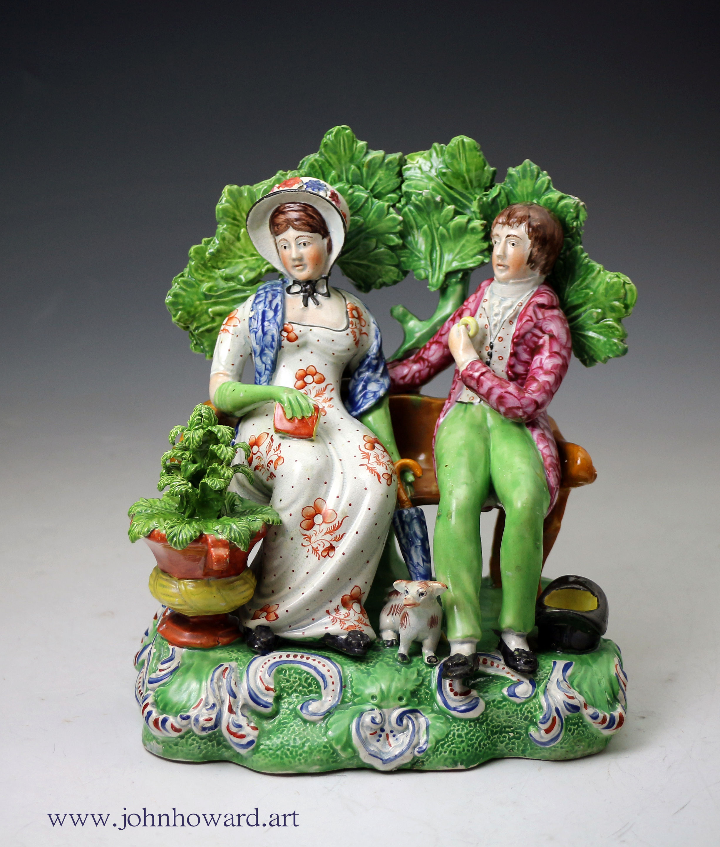 Staffordshire pearlware pottery figure group with bocage Persuasion antique period c 1820