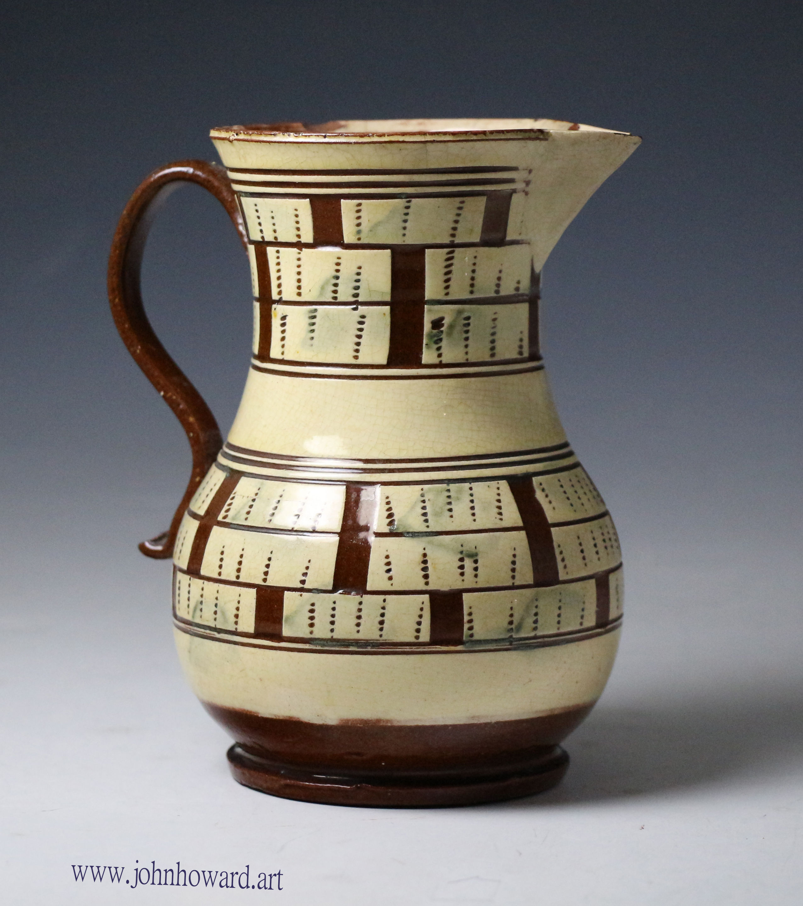 English slipware pitcher with scraffito checker board design mid 18th century antique period.