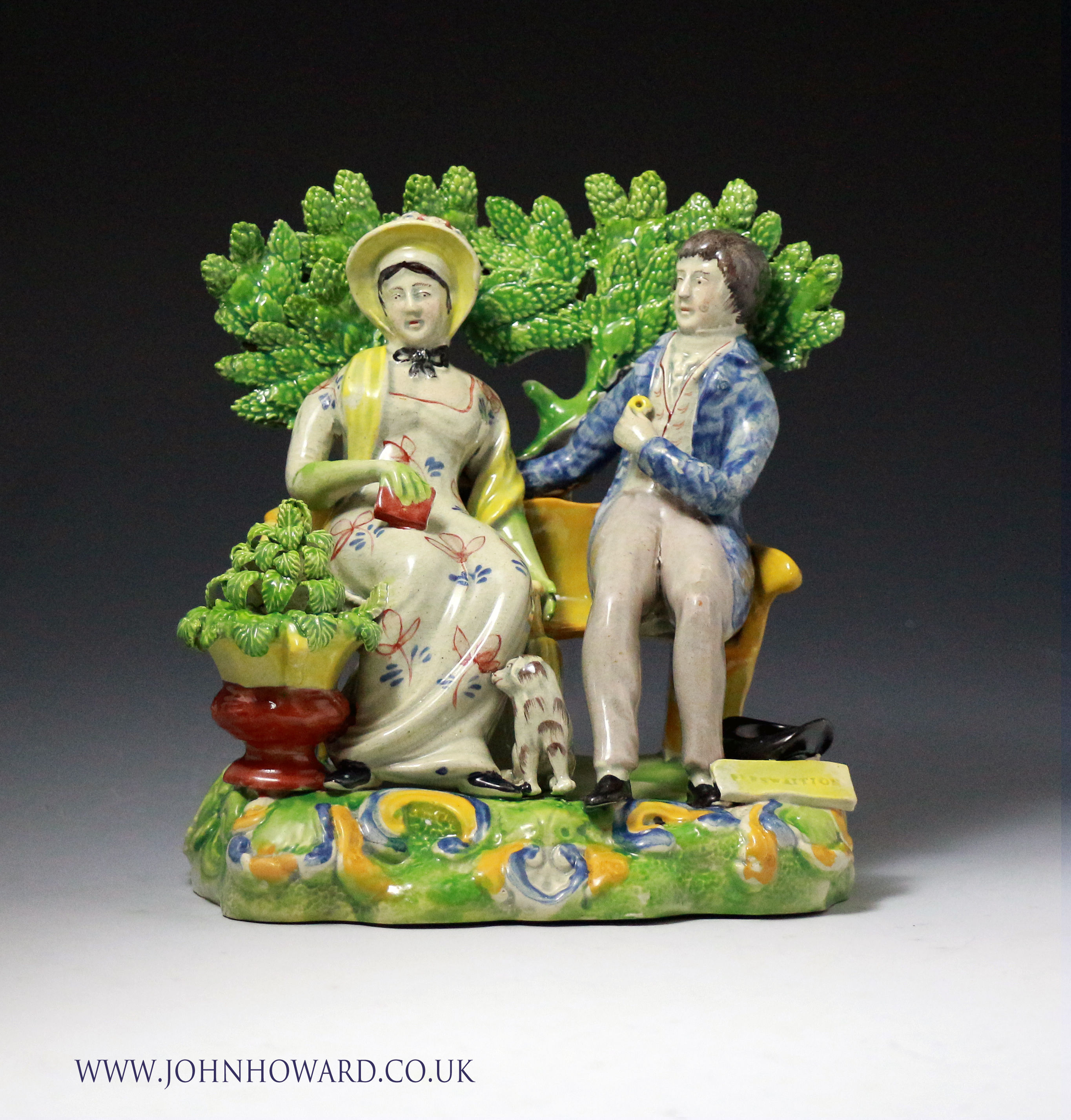 Antique Staffordshire pottery bocage figure group of Persuasion early 19th century